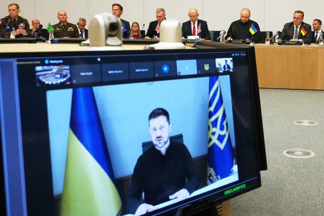 Volodymyr Zelensky speaking via video link