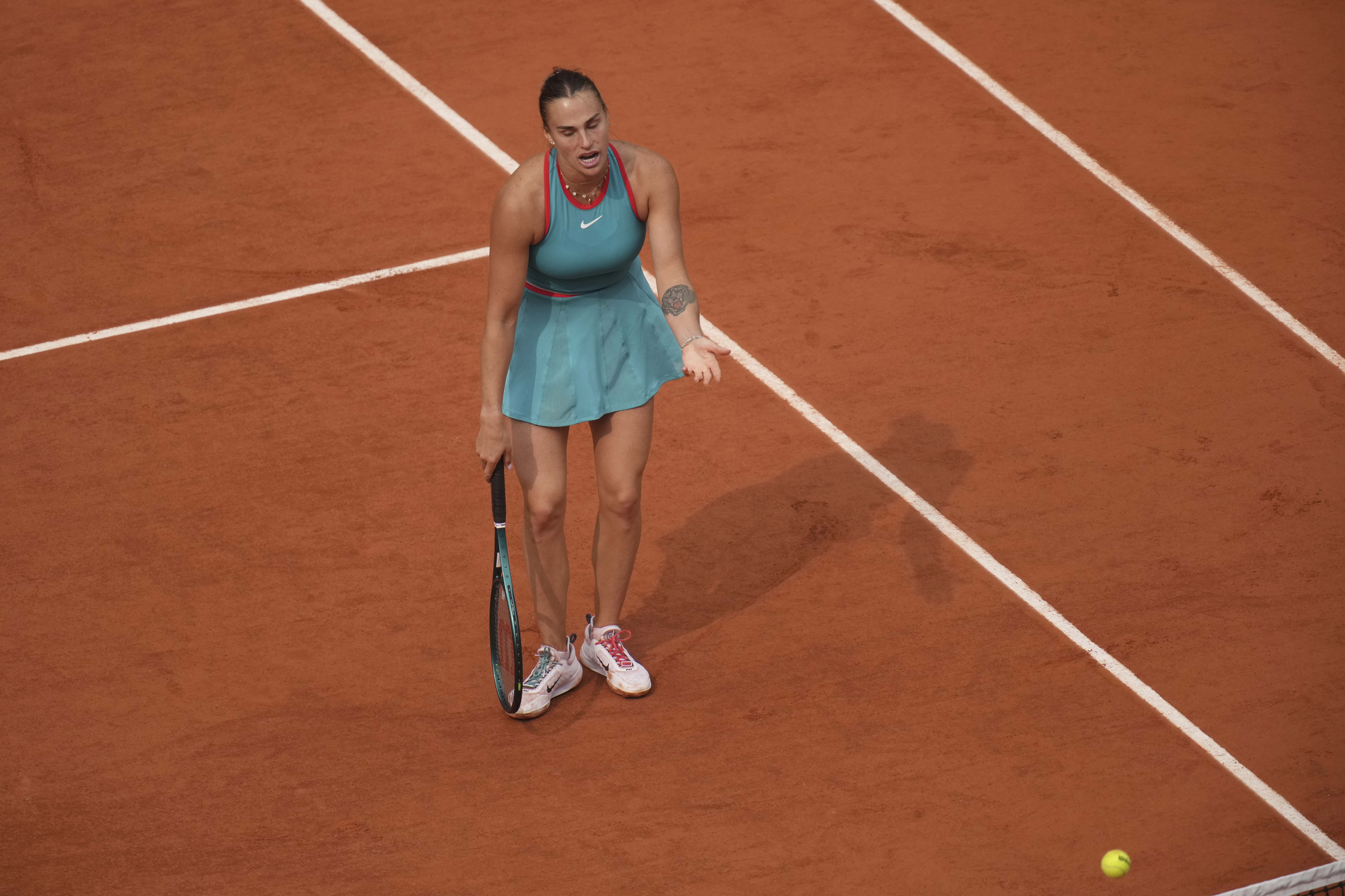 Aryna Sabalenka gestures in frustration in the French Open final against Coco Gauff