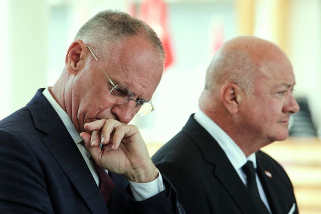 Austrian Interior Minister Gerhard Karner, left, and Chancellor Christian Stocker, right, attend a news conference