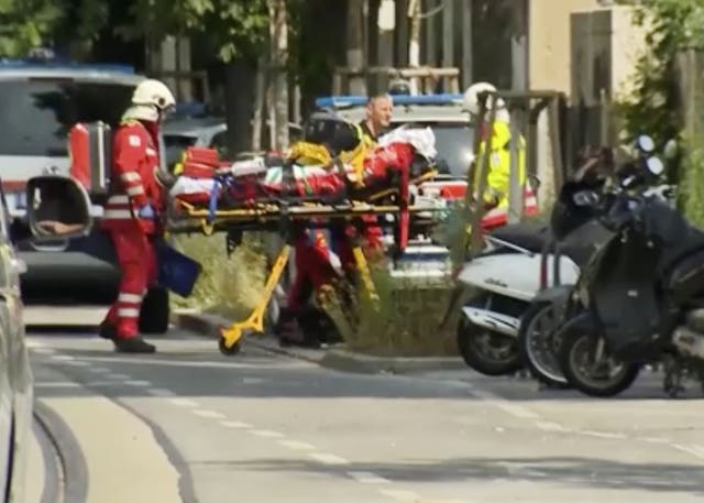 Someone is loaded into an ambulance