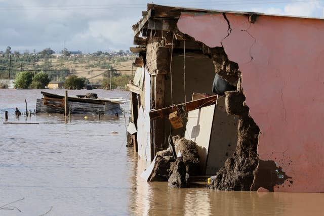 A view of homes submerged in floodwater, in Mthatha