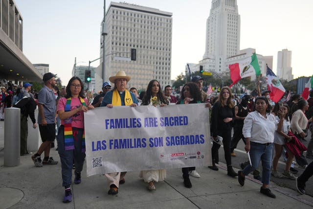 Demonstrators march during a protest Tuesday, June 10, 2025, in Los Angeles