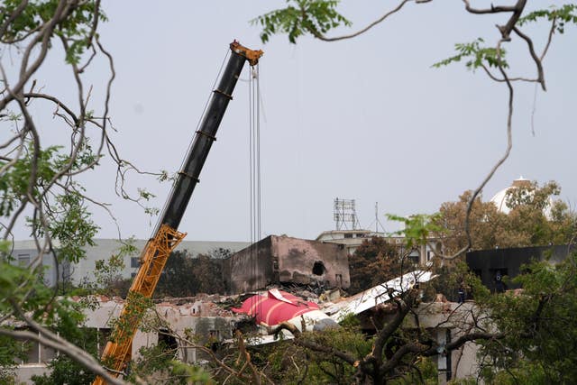 A crane at the site of the crash