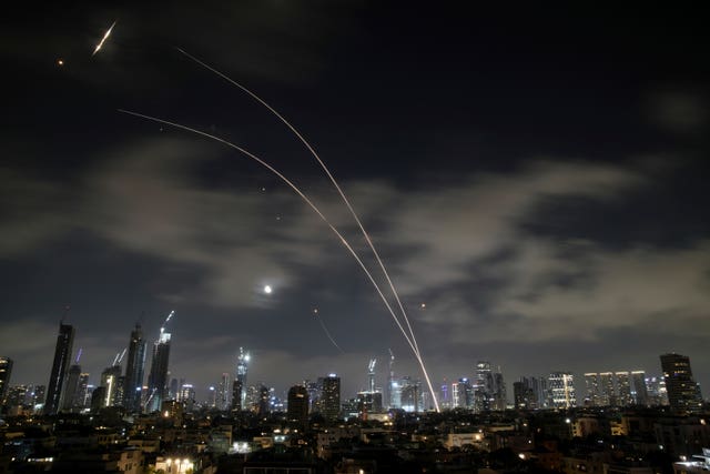 Israeli air defence system fires to intercept missiles during an Iranian attack over Tel Aviv