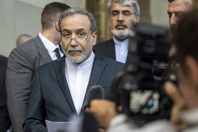 Iranian Foreign Minister Abbas Araghchi, speaks to the media after an Iran-EU nuclear meeting, in Geneva, Switzerland, Friday, June 20, 2025