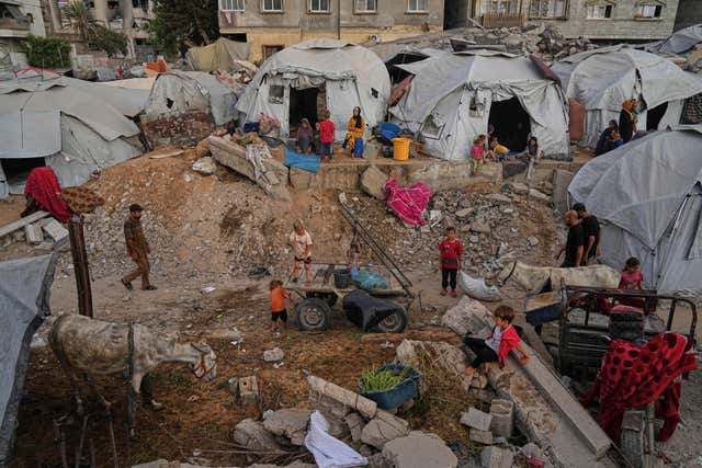 Displaced Palestinians in a tent camp in Gaza City