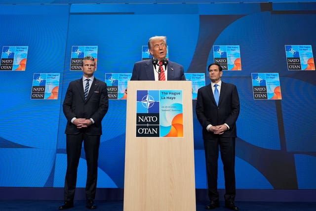 President Donald Trump speaks during a media conference at the end of the Nato summit as secretary of state Marco Rubio, right, and defence secretary Pete Hegseth listen, in The Hague, Netherlands