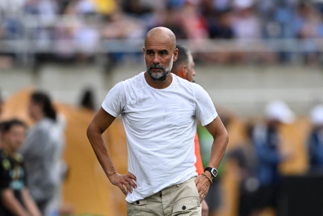 Manchester City manager Pep Guardiola looks on from the touchline during the Club World Cup game against Juventus