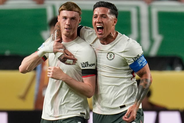 Chelsea’s Cole Palmer, left, is congratulated by Enzo Fernandez