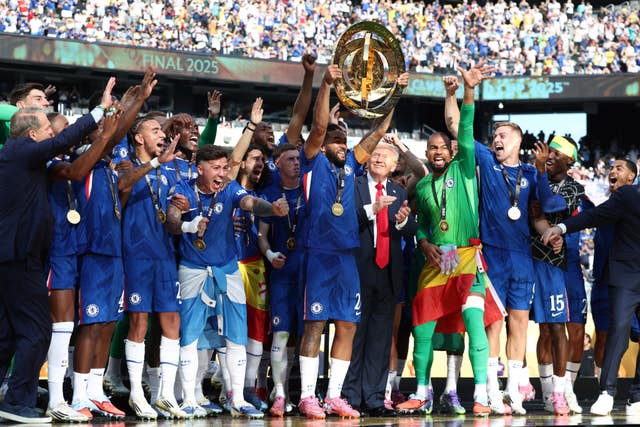 Chelsea’s Reece James lifts the trophy as he celebrates Club World Cup final victory over Paris St Germain with his team-mates and United States President Donald Trump
