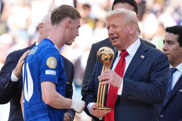 US president Donald Trump, right, presents the Golden Ball award to Chelsea’s Cole Palmer