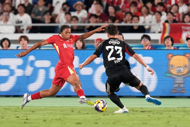 Liverpool’s Rio Ngumoha takes on Yokohama F Marinos’ Ryo Miyaichi