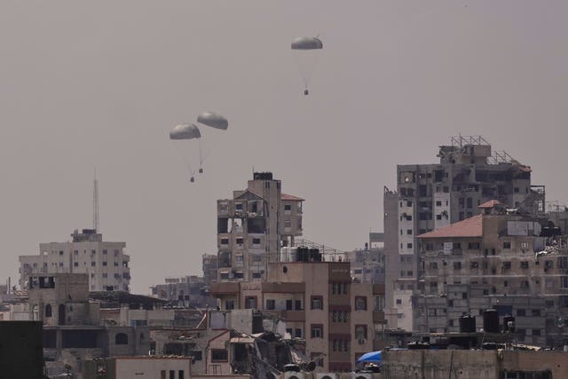 Humanitarian aid being airdropped to Palestinians over Gaza City
