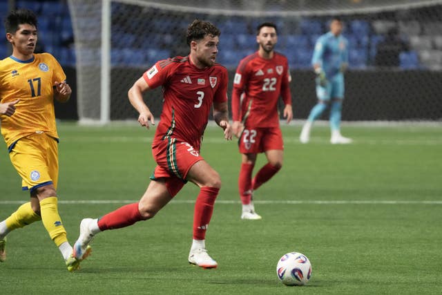 Neco Williams (centre) in action during the 2026 FIFA World Cup qualifying soccer match between Kazakhstan and Wales