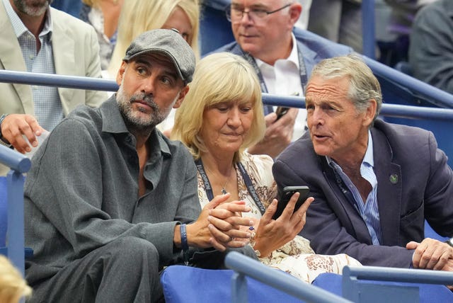 Manchester City manager Pep Guardiola, left, and Wimbledon chair Deborah Jevans were in the stands