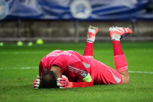 Italy’s goalkeeper Gianluigi Donnarumma reacts after conceding a goal