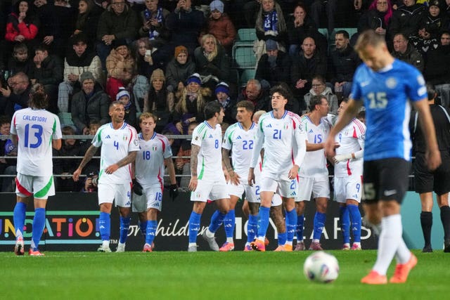 Italy players celebrate after Italy’s Francesco Pio Esposito scores