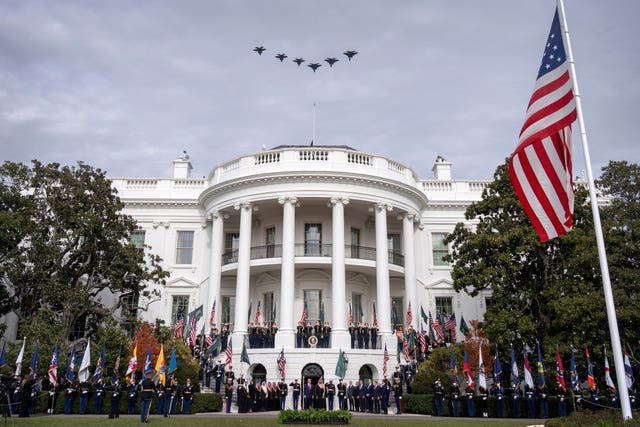 Military jets flying over the White House