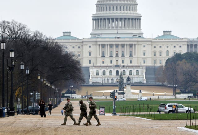 National Guard patrolling on the National Mall near the US Capitol in Washington
