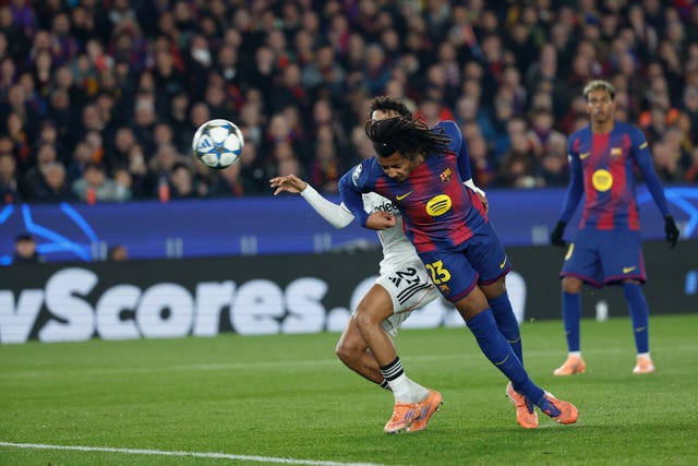 Jules Kounde scores a header for Barcelona