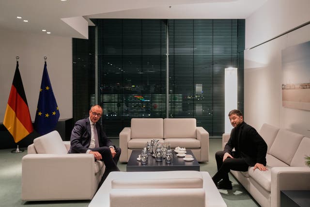 German chancellor Friedrich Merz, left, and Ukraine’s president Volodymyr Zelensky sat opposite each other on sofas