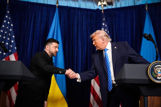 US president Donald Trump and Ukraine’s president Volodymyr Zelensky shake hands