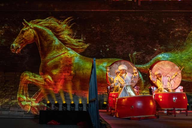 Drummers ring in the new year at the Great Wall on the outskirts of Beijing, China