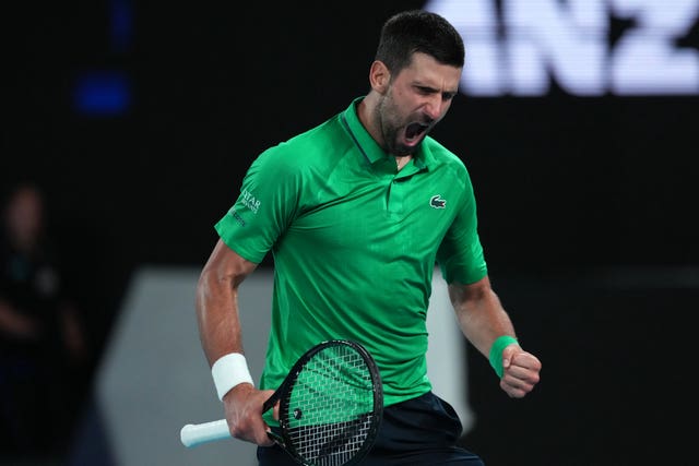 Novak Djokovic roars after winning a point
