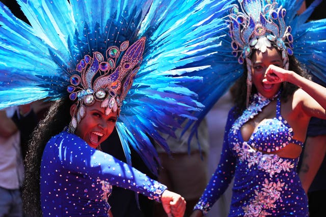 Brazil Carnival dancer in blue headdress