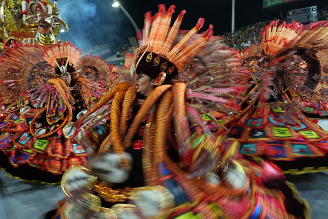 Dancers from the Mocidade Unida da Mooca samba school performing in Sao Paulo