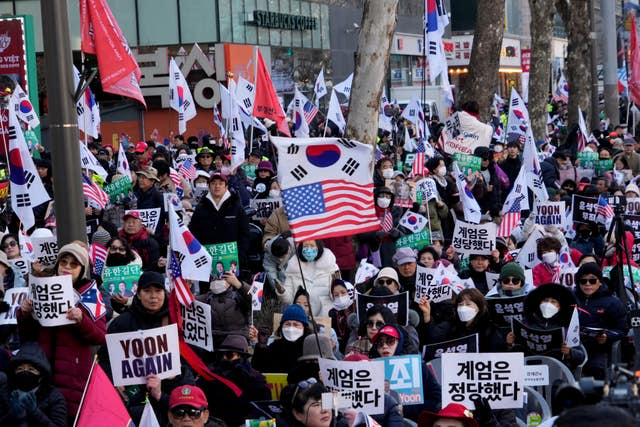Supporters of former South Korean president Yoon Suk Yeol stage a rally outside Seoul Central District Court in Seoul, South Korea