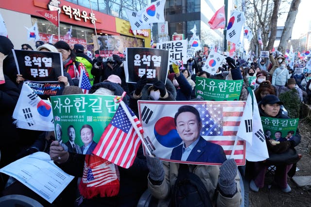Supporters of former South Korean president Yoon Suk Yeol stage a rally outside of Seoul Central District Court