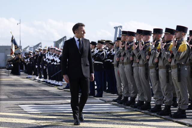 The French president inspects troops