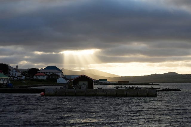 Sunlight breaks through the clouds over Stanley