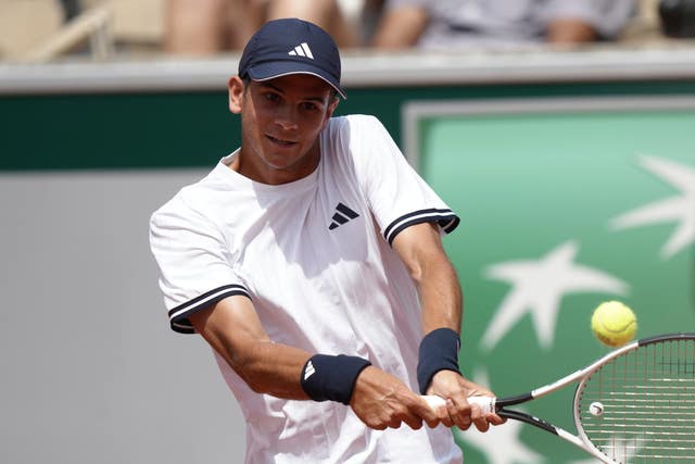 Rafael Jodar hits a backhand