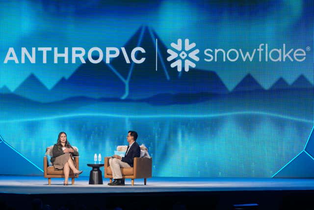 Anthropic co-founder and president Daniela Amodei speaks to Snowflake chief executive Sridhar Ramaswamy during the keynote presentation at Snowflake Summit 26 in San Francisco