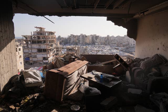 A damaged apartment in a residential building after an overnight Israeli strike
