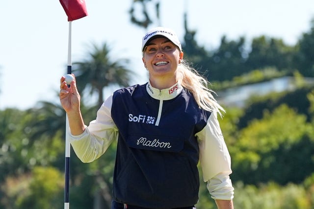 Charley Hull, of England, reacts after making her par putt on the 18th green during the final round of the U.S. Women’s Open