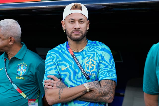 Neymar looks on ahead of Brazil's match against Morocco