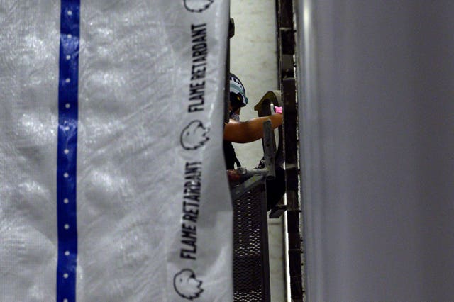 A worker removes a letter