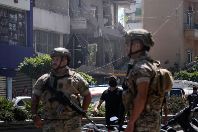 Lebanese soldiers at the site of the air strike
