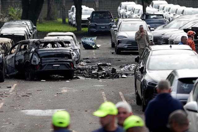 Burned vehicles and debris in Brazil