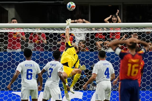 Cape Verde goalkeeper Vozinha makes a save during the World Cup match against Spain
