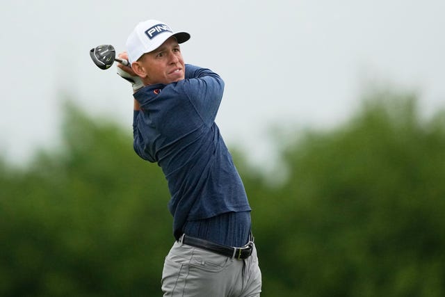 Sam Stevens watches his tee shot