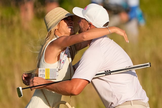 Wyndham Clark celebrates with his girlfriend Emily Tanner after winning the US Open