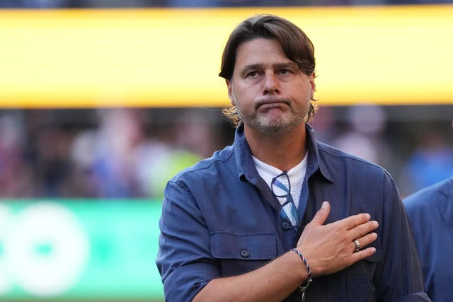 US coach Mauricio Pochettino acknowledges supporters after the team's World Cup defeat to Belgium