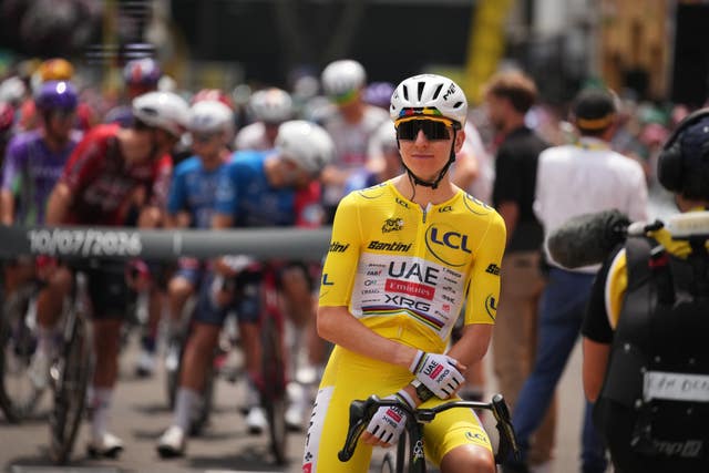 Slovenia’s Tadej Pogacar, wearing the overall leader’s yellow jersey, waits for the start of the seventh stage of the 2026 Tour de France