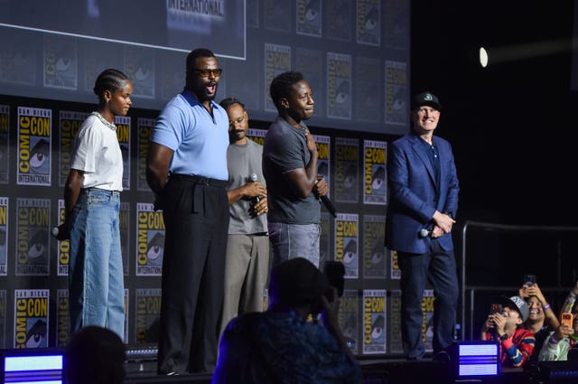 From left, Letitia Wright, Winston Duke, Ryan Coogler, David Jonsson, and Kevin Feige attend a panel for Marvel Studios during Comic-Con