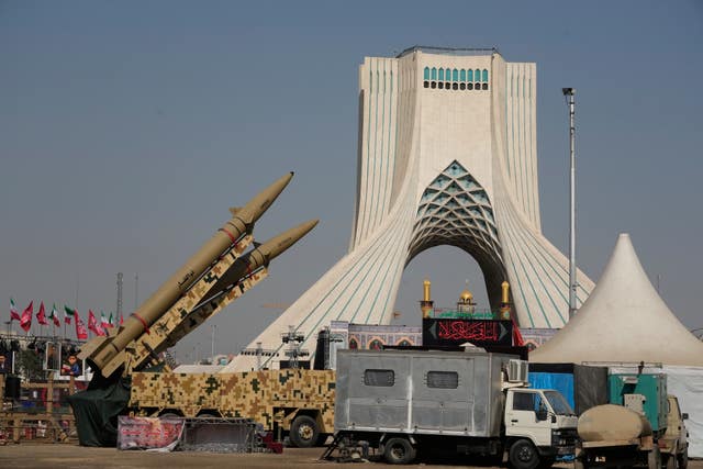 Iranian domestically-built Zolfaghar, top, and Zolfaghar Bassir missiles are displayed by the armed forces in a temporary exhibition in front of the Azadi (Freedom) monument in Tehran (Vahid Salemi/AP)