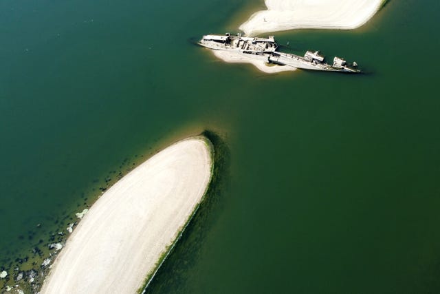 The wreckage of a Second World War German warship emerges, due to the drought, in front of Djerdap II, a large dam on the Danube River, between Romania and Serbia, near Prahovo, Serbia